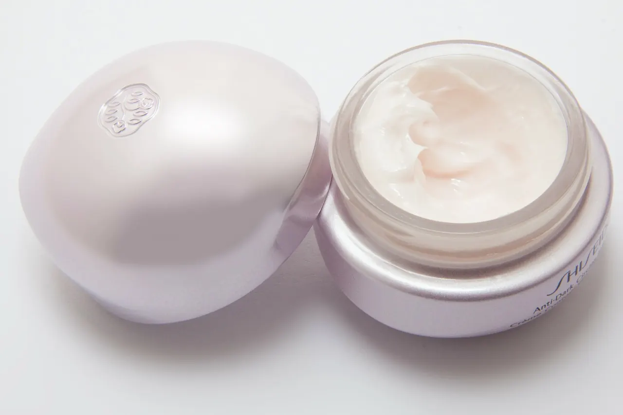 An open jar of face cream