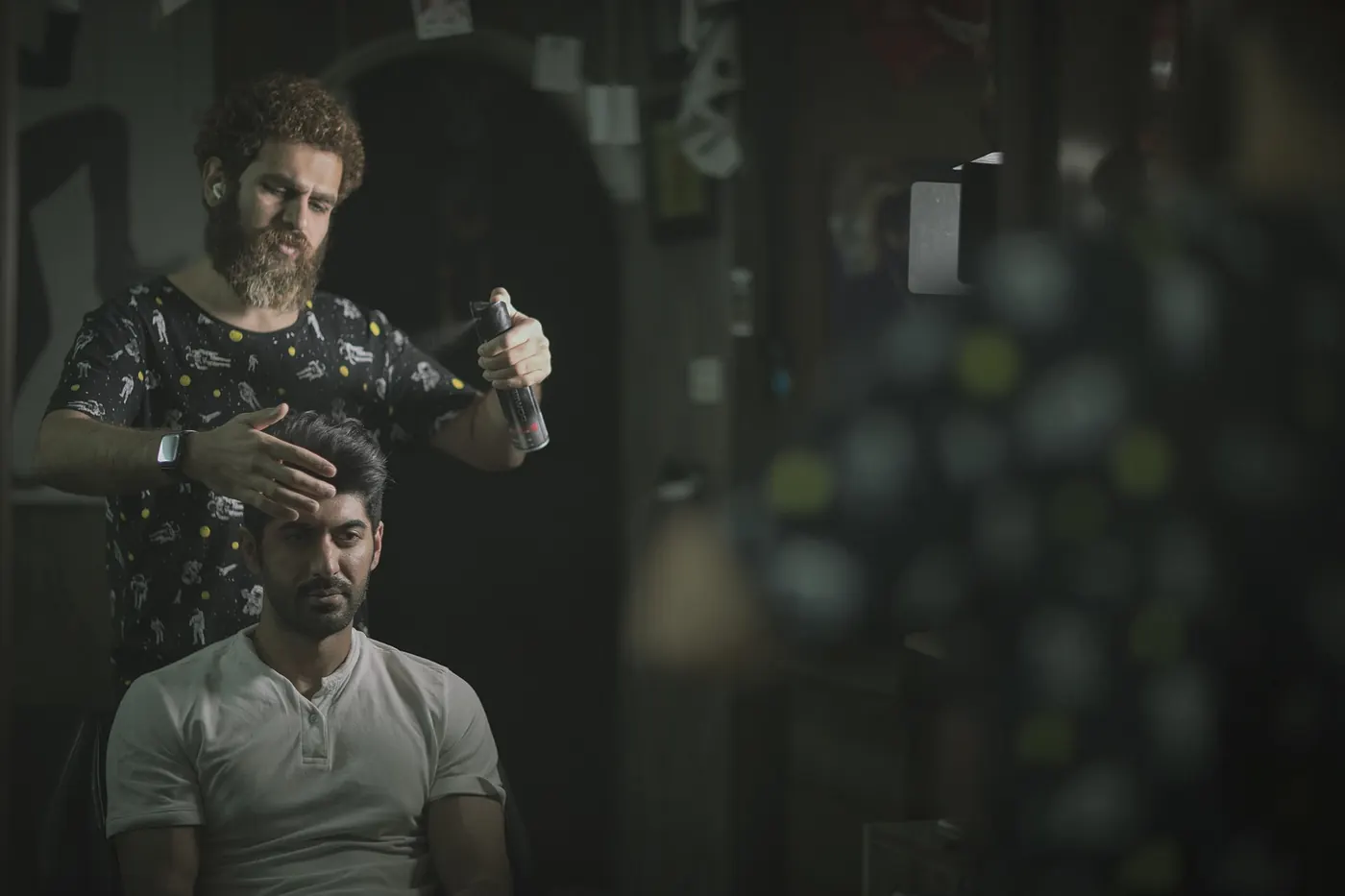 A hairdresser cutting a client's hair