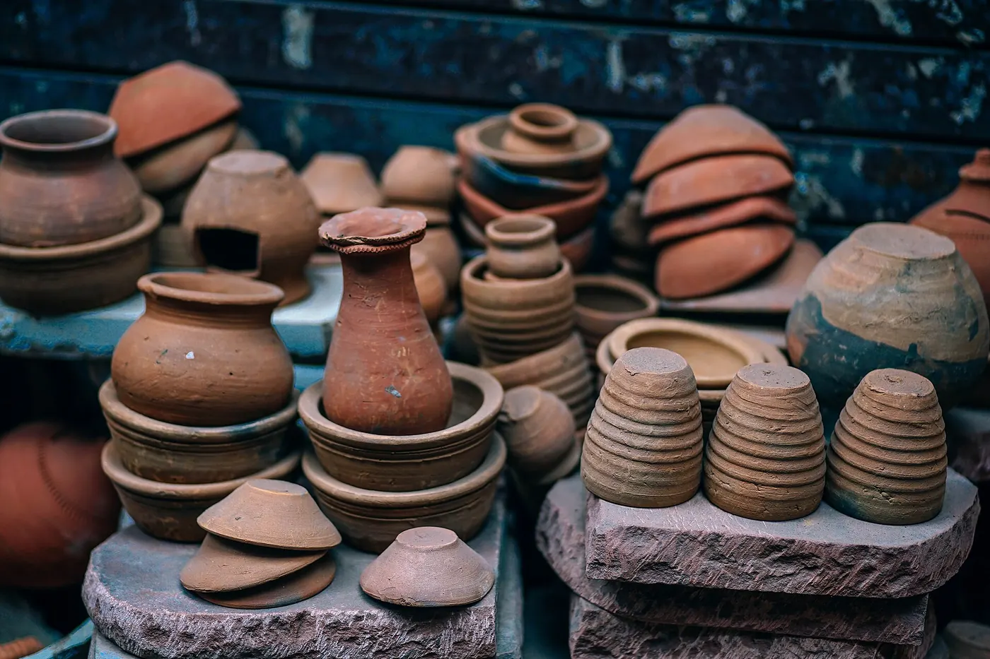 Handmade terracotta pots stacked for sale