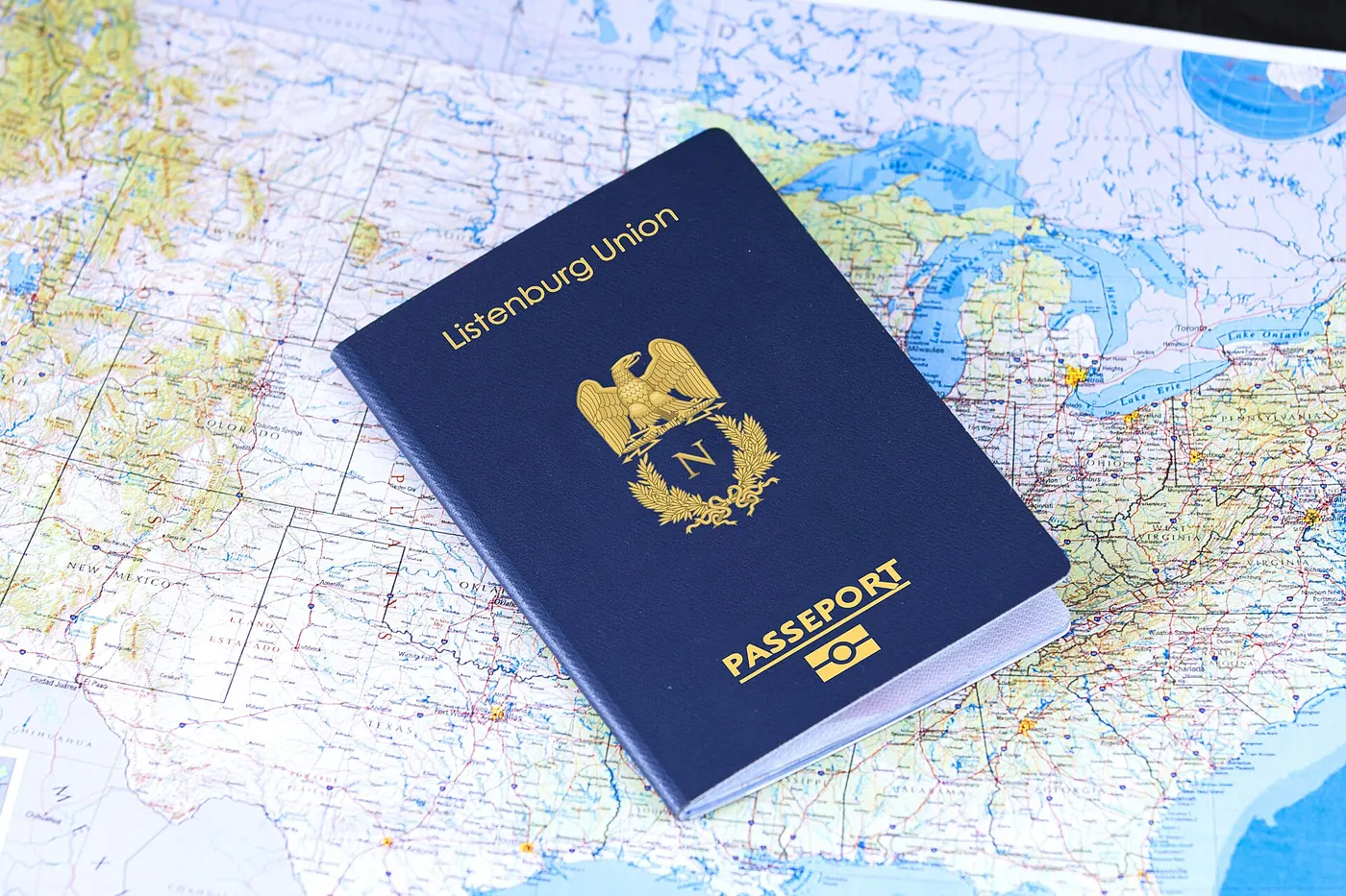 A passport lying on a world map
