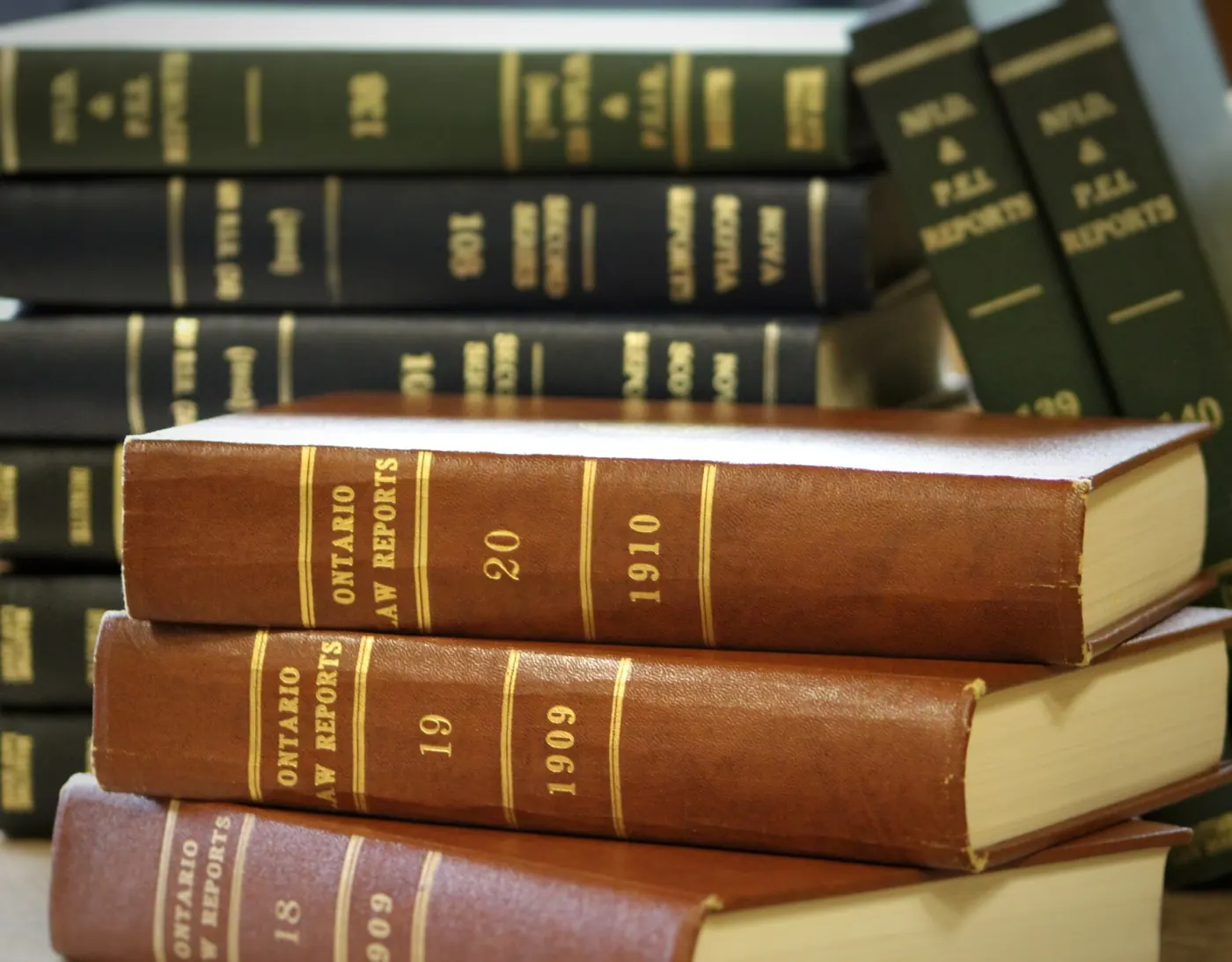 A stack of leather-bound law books