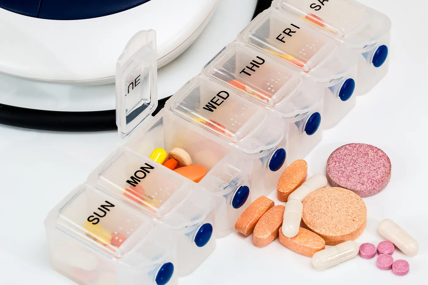 A weekly pill organiser with vitamins and supplements